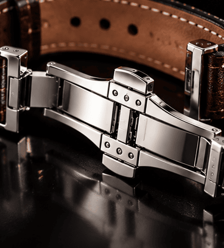 Close up of AVIGO luxury watch band with stainless steel and leather strap 
