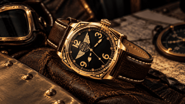 Luxury AVIGO watch with gold case and black dial on vintage leather 